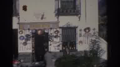 SPAIN-1966: Vintage 8mm Footage of Artisan Shop and Street Life