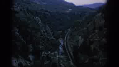 SPAIN-1966: A Long Railroad Filmed Between Wild Mountains