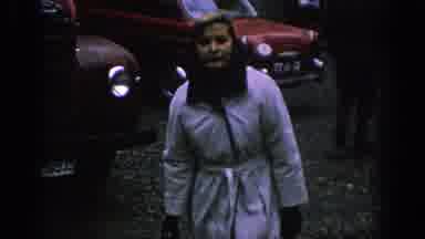 Spain (1966): Woman With Two Bags Walking