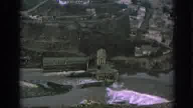 SPAIN-1966: Aerial View of Historic Riverside Village with Cathedral Landmark