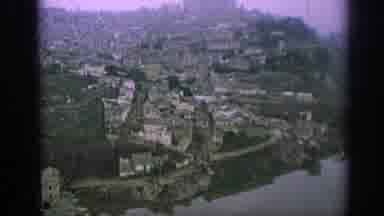 Spain (1966): Historic Colonial Style Riverside Town With Tall Church And Houses