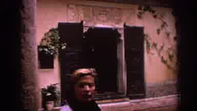 SPAIN-1966: Woman Checking The Surroundings To Her Beautiful Living Quarters