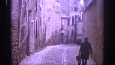 SPAIN-1966: Sightseeing Tour Through Narrow Streets Of Historic City With Many
