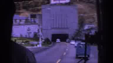 SPAIN-1966: Movie Transition From Driving On A Paved Road To Several Young