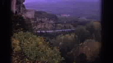 Spain (1966): Aerial Views Of Road Leading To Village Castle Nestled Among Hills