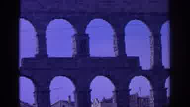 SPAIN-1966: Sunrise Or Sunset Viewed From Roman Aqueduct Architecture