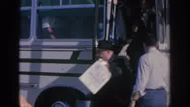 Spain (1966): People Getting Off A Bus