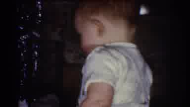 Omaha Nebraska USA (1968): Little Boy Aged 2 Staggering In Front Of Toy Trying To