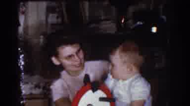Omaha Nebraska USA (1968): Mother Rocking Cute Baby