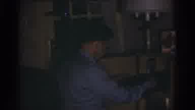Omaha Nebraska USA (1968): Hard To See Man Putting Something On A Shelf And