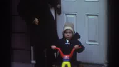 Bedford Virginia USA (1971): Toddler On A Colorful Tricycle Following Two Grownups