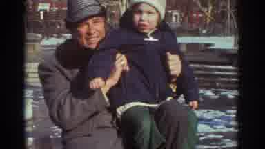 Bedford Virginia USA (1971): Man And Child Outside Waving