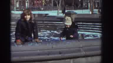 Bedford Virginia USA (1971): Kids Wearing Warm Clothing Playing In A Park Monument