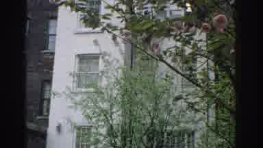 Miami Florida USA (1971): Panning Video Of A Building With A Woman On Top