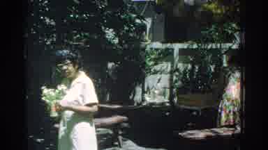 Miami Florida USA (1971): Two Ladies In Dresses Sprucing Up The Yard A Little Bit