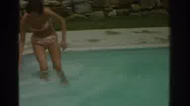 Miami Florida USA (1971): Young Woman In Bikini Stepping Into Pool To Join Another