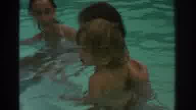 Miami Florida USA (1971): Mother With Kids Swimming In The Pool