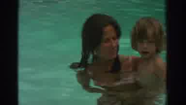 Miami Florida USA (1971): A Woman And Her Son Having Fun On A Pool Day