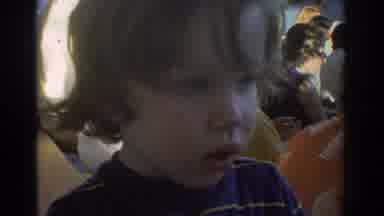 Miami Florida USA (1971): A Kid, Surrounded By Other Kids Seemingly Of His Own Age