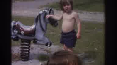 Miami Florida USA (1971): Little Boy Playing On A Seesaw
