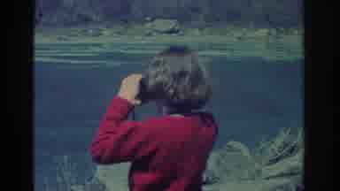 Niagra Falls New York USA (1971): Father And Son Use Binoculars To Look At A
