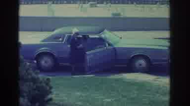 Niagra Falls New York USA (1971): Woman Waiting For Little Boy To Get Into Car