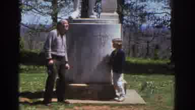 Richmond Virginia USA (1971): A Man And A Boy Stand In Front Of A Marble Statue