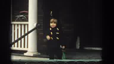 Philadephia Pennsylvania USA (1972): Kid Waving To The Camera And Then Jumping To