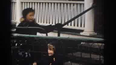 Philadephia Pennsylvania USA (1972): Women Watching Small Child Hop Down Stairs On