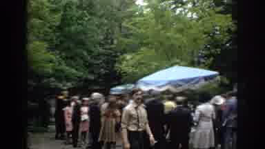 Philadephia Pennsylvania USA (1972): A Group Of People Gather Around A Set Of