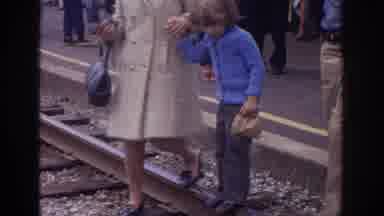 Philadephia Pennsylvania USA (1972): Couple Holding Childs Hand As They Cross