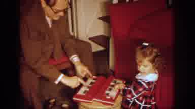 Philadephia Pennsylvania USA (1972): Little Girl Is Disinterested In Playing With