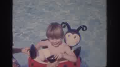 Philadephia Pennsylvania USA (1972): Kid Floating Freely In A Pool On A Hot Summer