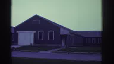 Toronto Canada (1972): Panning Shot Of Suburban Area With Well-Kept Lawns With A