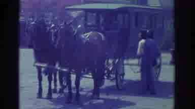 Toronto Canada (1972): A Carriage Sign Is Shown Then A Man Is Shown Standing Next