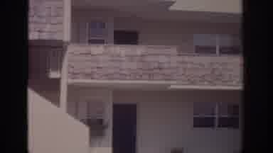Naples Florida USA-1973: Vintage 8mm Footage Of White Apartment Complex With Shingled Balconies