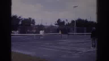 Naples Florida USA (1973): People Playing Mixed Double Tennis Games At Multiple