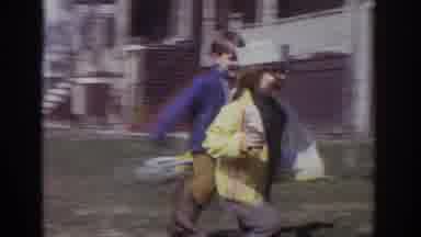 Philadephia Pennsylvania USA (1973): Kids Playing With The Dog On The Playground