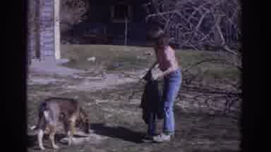 Philadephia Pennsylvania USA (1973): Woman Plays With Her Dog