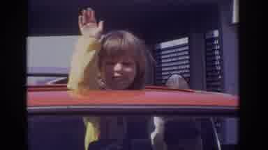 Philadelphia Pennsylvania USA (1973): Kid Is Very Excited To Ride In Red Car With