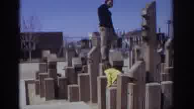 Philadelphia Pennsylvania USA (1973): Man, Children Exploring Wooden Outdoor