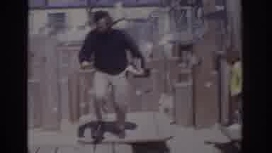 Philadelphia Pennsylvania USA (1973): Man Plays On Wooden Playscape By Jumping