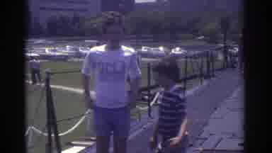 Cleveland Ohio USA (1974): Kids And People Having Fun In The City While Cars Pass