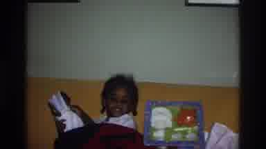 Atlanta Georgia USA (1975): Adorable Young Child Sitting As She Plays With Her