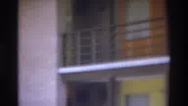 Atlanta Georgia USA (1975): Zoom In On Balcony Of A Two-Story Building, Someone