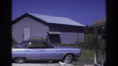 Atlanta Georgia USA (1975): People Gather On The Front Porch Of A Run Down Rural
