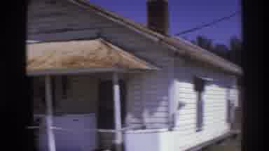 Atlanta Georgia USA (1975): One Man Is Walking Outside Of The House And The Other
