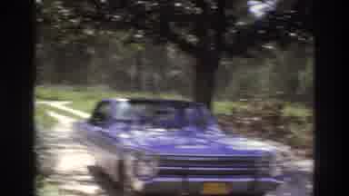 Atlanta Georgia USA (1975): Family Gathered Outside The House With A Car In Front