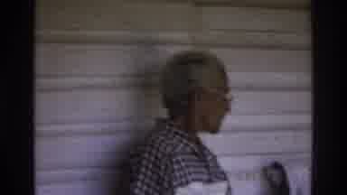 Atlanta Georgia USA (1975): Old Man And A Boy Is Doing Something In A House