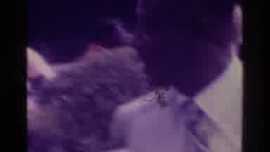 Atlanta Georgia USA (1975): Man Walks Toward Camera Crowd In Background
